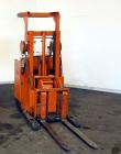 Used Raymond Corporation Stand Up Electric Reach Lift Truck, Model 20-R30TT. 3000 Pound capacity at 190” lift height. (2) Stage mast. Includes a Gould 24 volt battery charger, model GFC-12-900T1. Hou...
