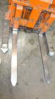 Used Raymond Corporation Stand Up Electric Reach Lift Truck, Model 20-R30TT. 3000 Pound capacity at 190” lift height. (2) Stage mast. Includes a Gould 24 volt battery charger, model GFC-12-900T1. Hou...