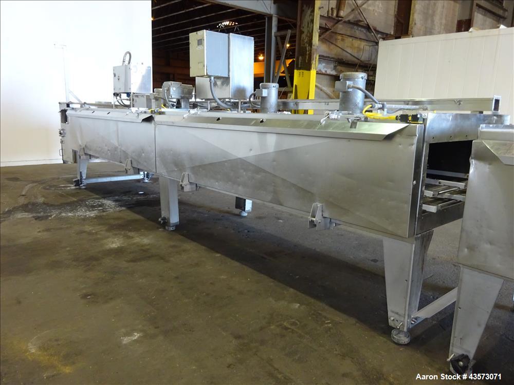 Used Praxair Nitrogen Freeze Tunnel. Section 1 conveyor belt 230" long x 42" wide, second conveyor belt 140" long x 42" wide. Serial No. 90092 R/W. Built 1999.