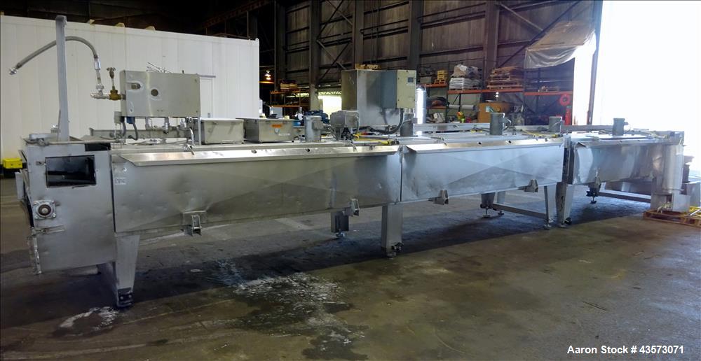 Used Praxair Nitrogen Freeze Tunnel. Section 1 conveyor belt 230" long x 42" wide, second conveyor belt 140" long x 42" wide. Serial No. 90092 R/W. Built 1999.
