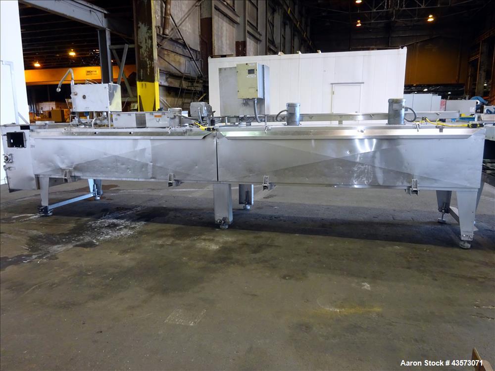 Used Praxair Nitrogen Freeze Tunnel. Section 1 conveyor belt 230" long x 42" wide, second conveyor belt 140" long x 42" wide. Serial No. 90092 R/W. Built 1999.