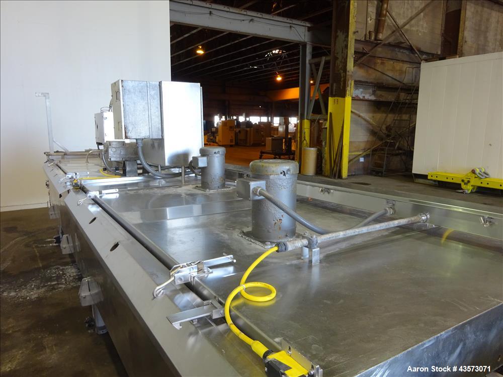 Used Praxair Nitrogen Freeze Tunnel. Section 1 conveyor belt 230" long x 42" wide, second conveyor belt 140" long x 42" wide. Serial No. 90092 R/W. Built 1999.
