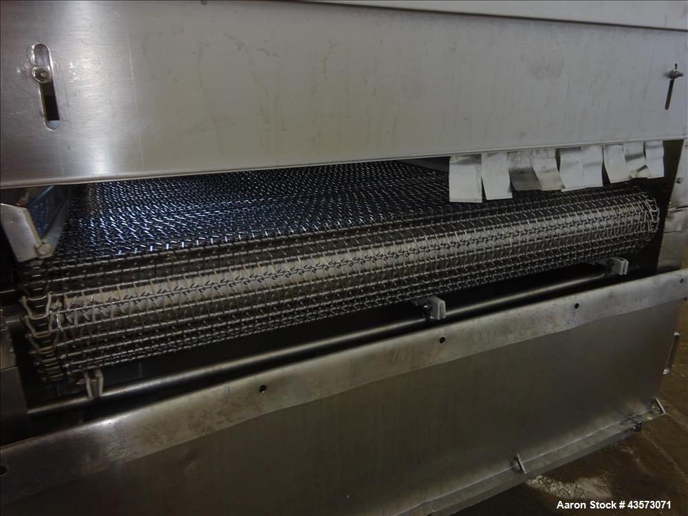 Used Praxair Nitrogen Freeze Tunnel. Section 1 conveyor belt 230" long x 42" wide, second conveyor belt 140" long x 42" wide. Serial No. 90092 R/W. Built 1999.