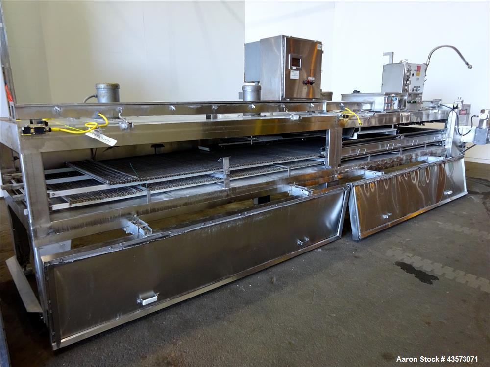 Used Praxair Nitrogen Freeze Tunnel. Section 1 conveyor belt 230" long x 42" wide, second conveyor belt 140" long x 42" wide. Serial No. 90092 R/W. Built 1999.
