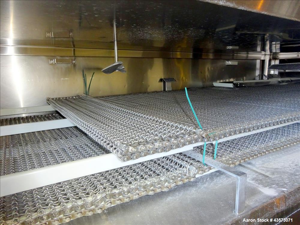 Used Praxair Nitrogen Freeze Tunnel. Section 1 conveyor belt 230" long x 42" wide, second conveyor belt 140" long x 42" wide. Serial No. 90092 R/W. Built 1999.