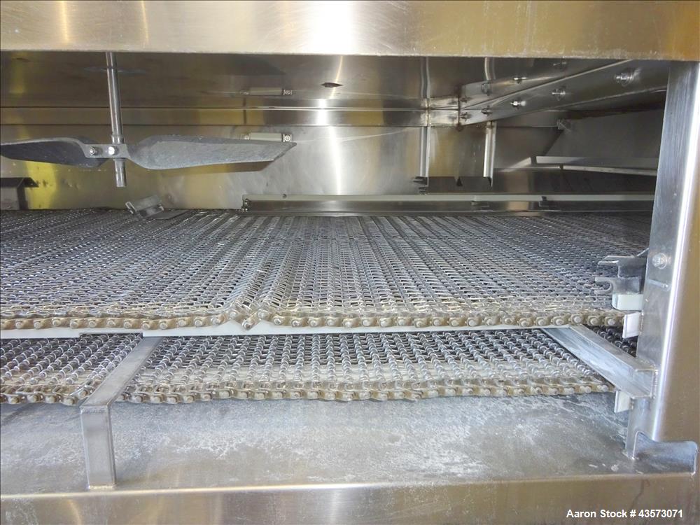 Used Praxair Nitrogen Freeze Tunnel. Section 1 conveyor belt 230" long x 42" wide, second conveyor belt 140" long x 42" wide. Serial No. 90092 R/W. Built 1999.