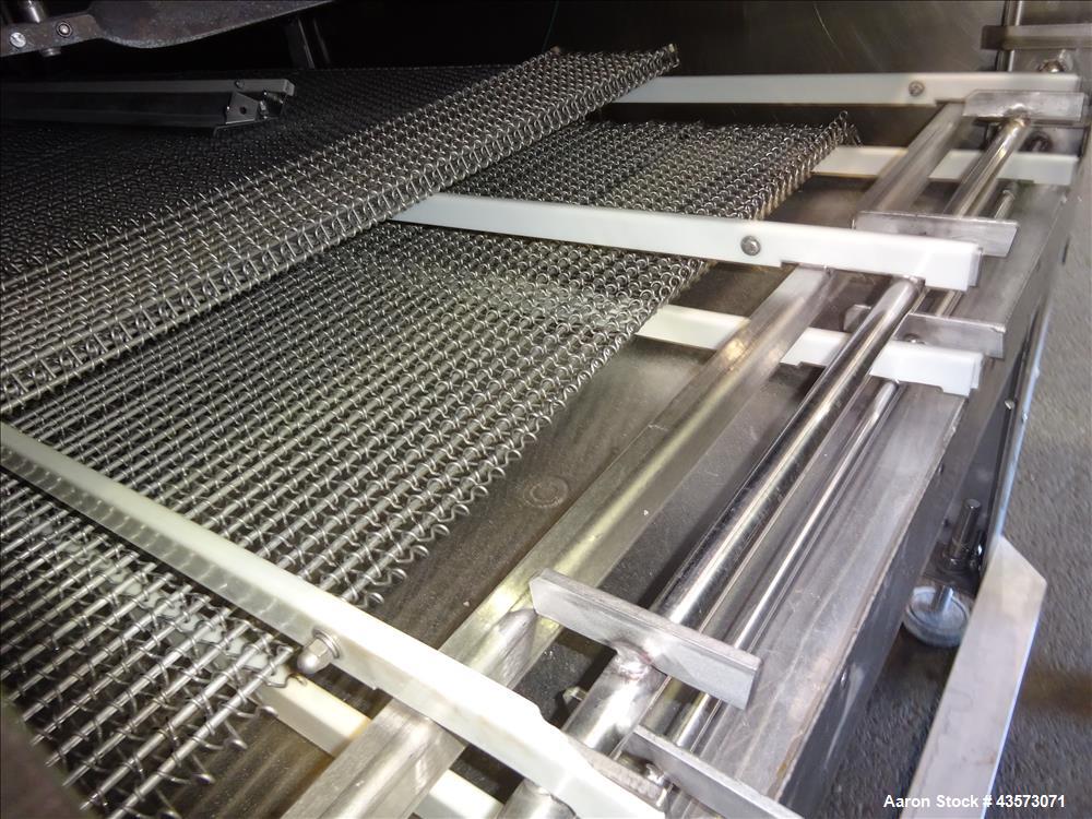 Used Praxair Nitrogen Freeze Tunnel. Section 1 conveyor belt 230" long x 42" wide, second conveyor belt 140" long x 42" wide. Serial No. 90092 R/W. Built 1999.