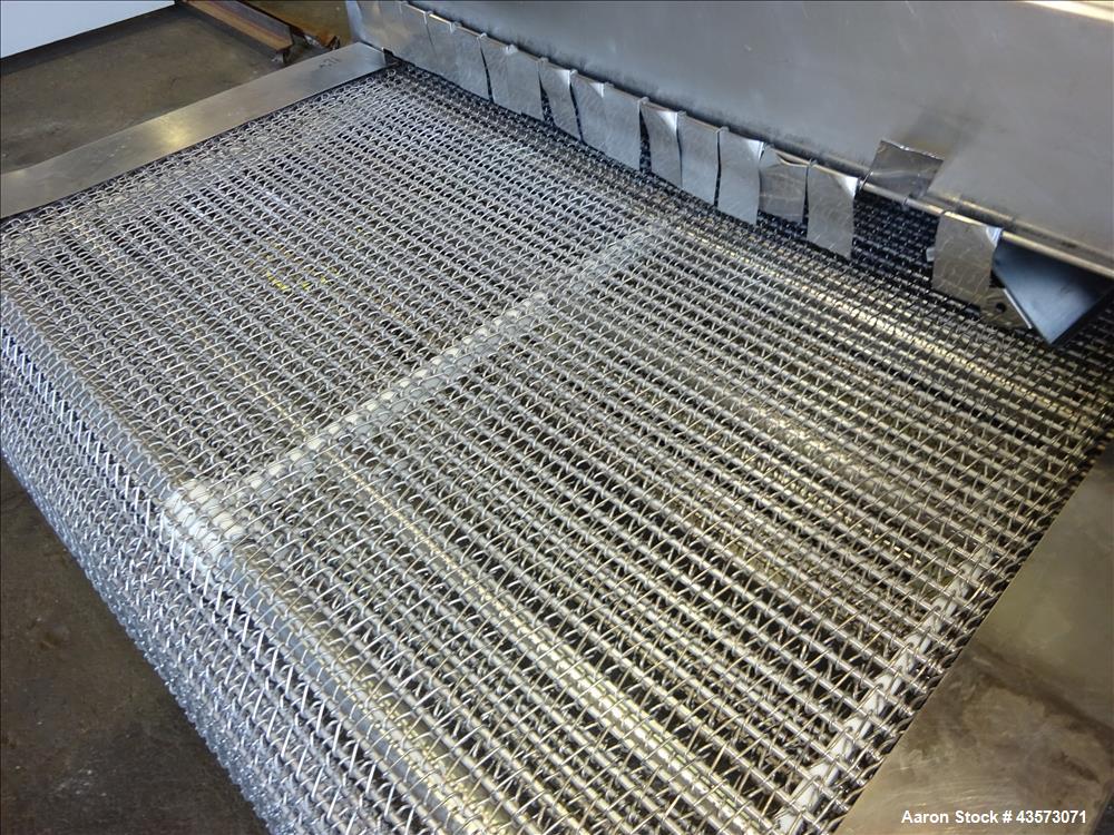 Used Praxair Nitrogen Freeze Tunnel. Section 1 conveyor belt 230" long x 42" wide, second conveyor belt 140" long x 42" wide. Serial No. 90092 R/W. Built 1999.