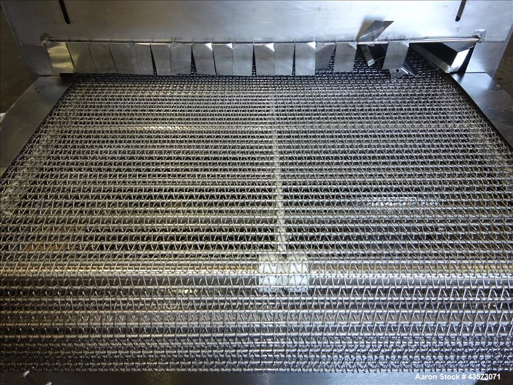 Used Praxair Nitrogen Freeze Tunnel. Section 1 conveyor belt 230" long x 42" wide, second conveyor belt 140" long x 42" wide. Serial No. 90092 R/W. Built 1999.