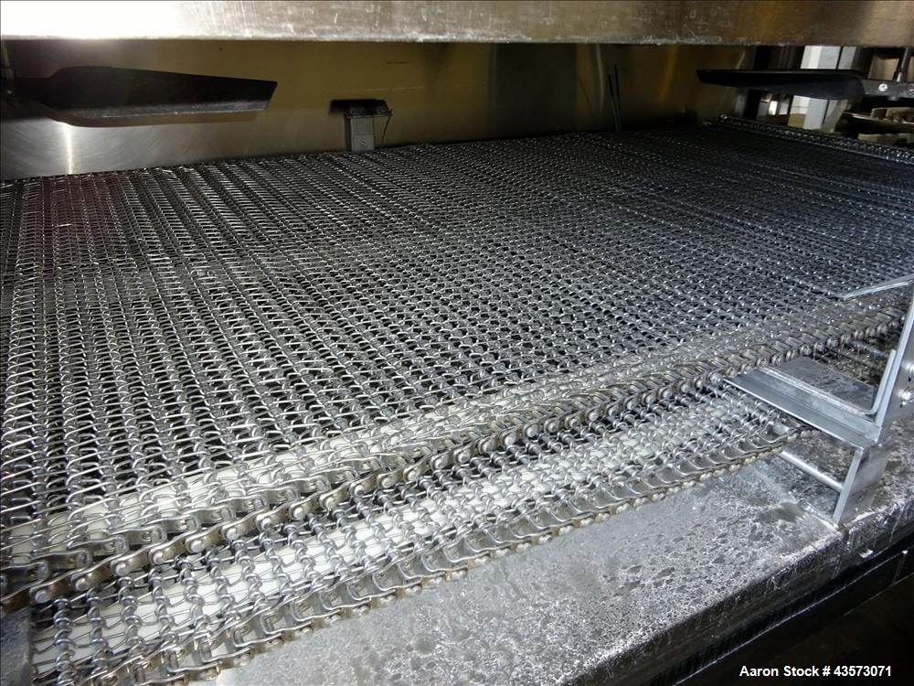 Used Praxair Nitrogen Freeze Tunnel. Section 1 conveyor belt 230" long x 42" wide, second conveyor belt 140" long x 42" wide. Serial No. 90092 R/W. Built 1999.