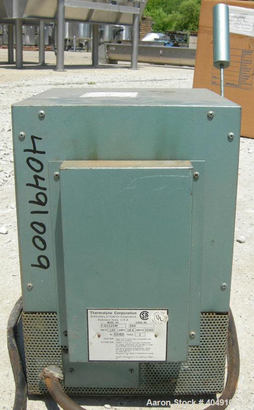Used Thermolyne Benchtop Industrial Furnace, Model F-D1525M. Operating temperature 100-1200 deg C (212-2192 F). 136 cubic inch chamber 4" wide x 3 3/4" tall x 9" deep. Front door. 1/50/60/120 volt, 1...