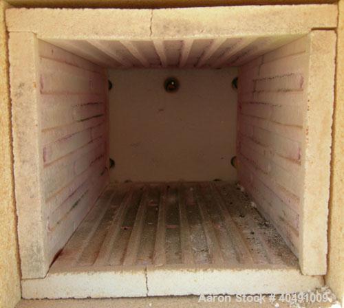 Used Thermolyne Benchtop Industrial Furnace, Model F-D1525M. Operating temperature 100-1200 deg C (212-2192 F). 136 cubic inch chamber 4" wide x 3 3/4" tall x 9" deep. Front door. 1/50/60/120 volt, 1...