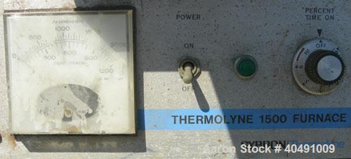 Used Thermolyne Benchtop Industrial Furnace, Model F-D1525M. Operating temperature 100-1200 deg C (212-2192 F). 136 cubic inch chamber 4" wide x 3 3/4" tall x 9" deep. Front door. 1/50/60/120 volt, 1...