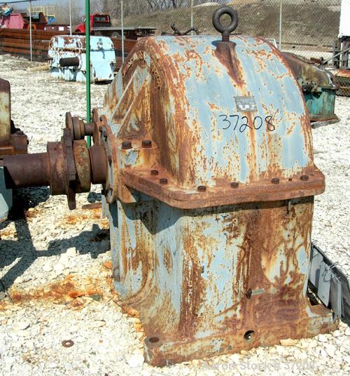 USED: Philadelphia parallel shaft gear reducer, model 3227, type T. HP rating 405-225.1. 1750/870 rpm input, 56.09/28.045 rpm output. 31.2:1 ratio. Input and output shafts on the same side. 43" betwe...