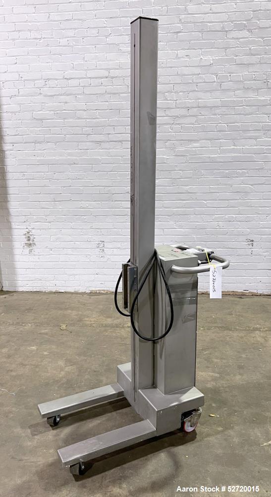 Used Packline Compac Platform Attachment Stainless Steel Portable Lift. Approximate capacity 275 Pounds. Approximate 80" lift height. Serial# K2069. Missing platform attachment.