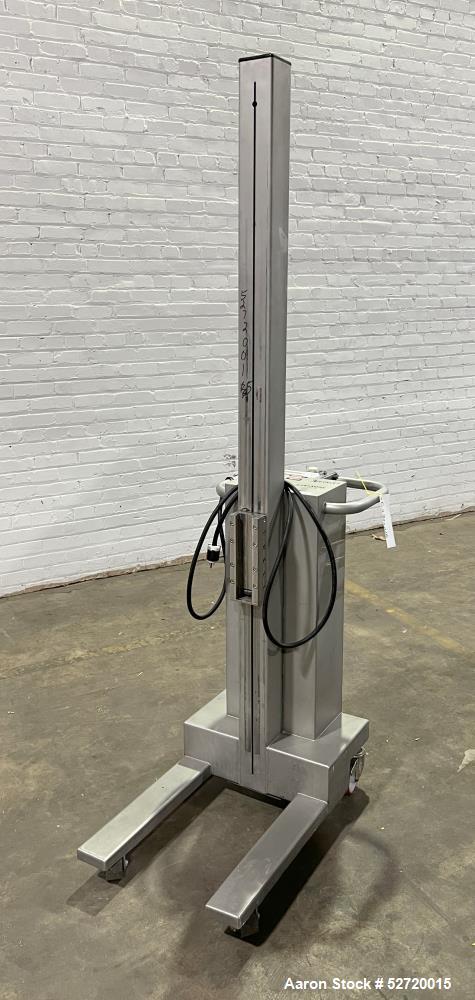 Used Packline Compac Platform Attachment Stainless Steel Portable Lift. Approximate capacity 275 Pounds. Approximate 80" lift height. Serial# K2069. Missing platform attachment.