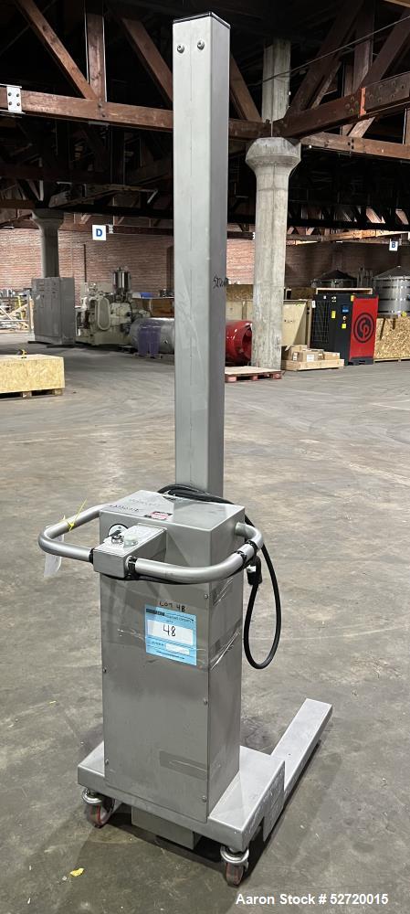 Used Packline Compac Platform Attachment Stainless Steel Portable Lift. Approximate capacity 275 Pounds. Approximate 80" lift height. Serial# K2069. Missing platform attachment.