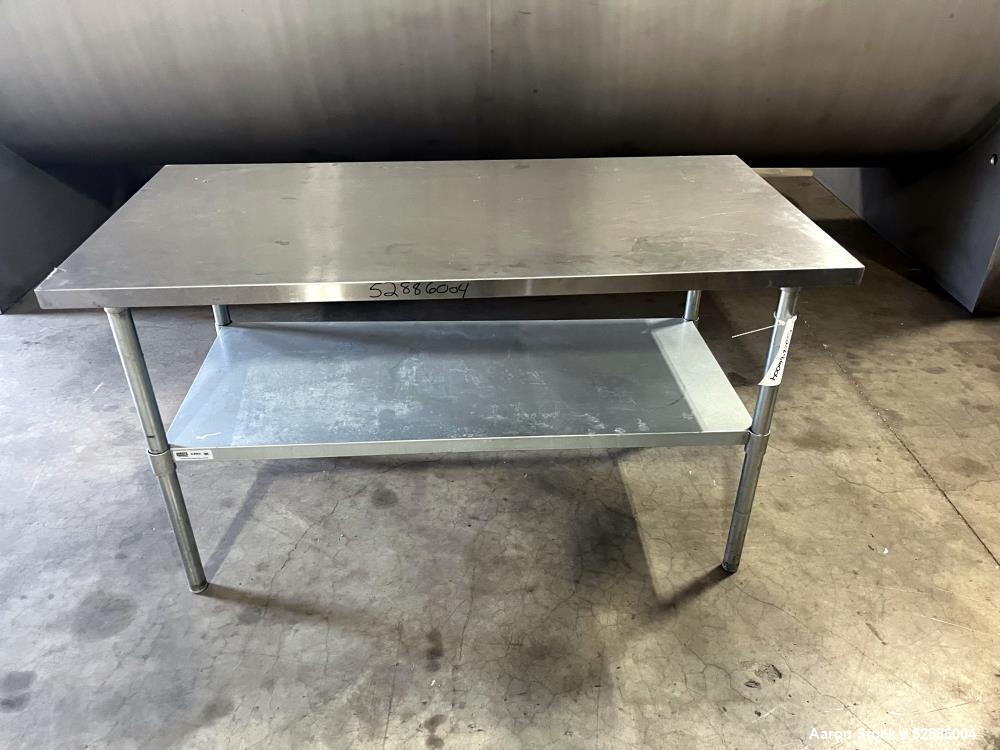 Used- ULine Economy Stainless Steel Worktable with Bottom Shelf, 304 Stainless Steel. 60" long x 30" wide top surface, 53" l...