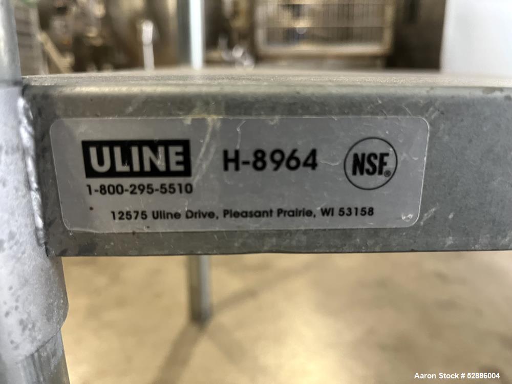 Used- ULine Economy Stainless Steel Worktable with Bottom Shelf, 304 Stainless Steel. 60" long x 30" wide top surface, 53" l...