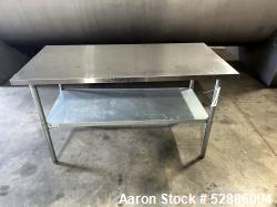 Used- ULine Economy Stainless Steel Worktable with Bottom Shelf, 304 Stainless Steel. 60" long x 30" wide top surface, 53" l...