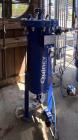 Used Quincy Air Treatment Unit. Industrial compressed-air vessel, identified as Unit 3, is a vertical steel separator/filter housing designed for inline air-treatment service within a multi-compresso...