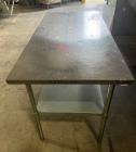 Used- ULine Economy Stainless Steel Worktable with Bottom Shelf, 304 Stainless Steel. 60