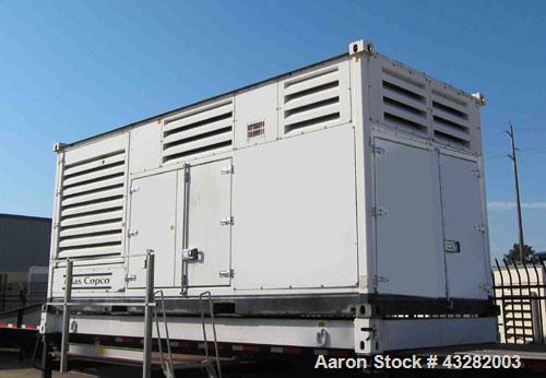 Used Atlas Copco QAC 1006 Package, DDC/MTU, 1000kW standby (900kW prime) portable diesel generator set. DDC/MTU model 16V2000 R163-7K37, EPA Tier 1, four-stroke diesel engine. Mecc-Alte Model ECO 43-...