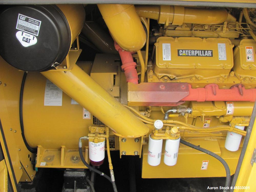 Used Caterpillar 650 kW standby diesel generator set. CAT 3412 engine rated 968 HP at 1800 RPM, SN-1EZ06825.  3/60/277/480V, 12 lead reconnectable to other voltages. 1000 Amp mainline circuit breaker...
