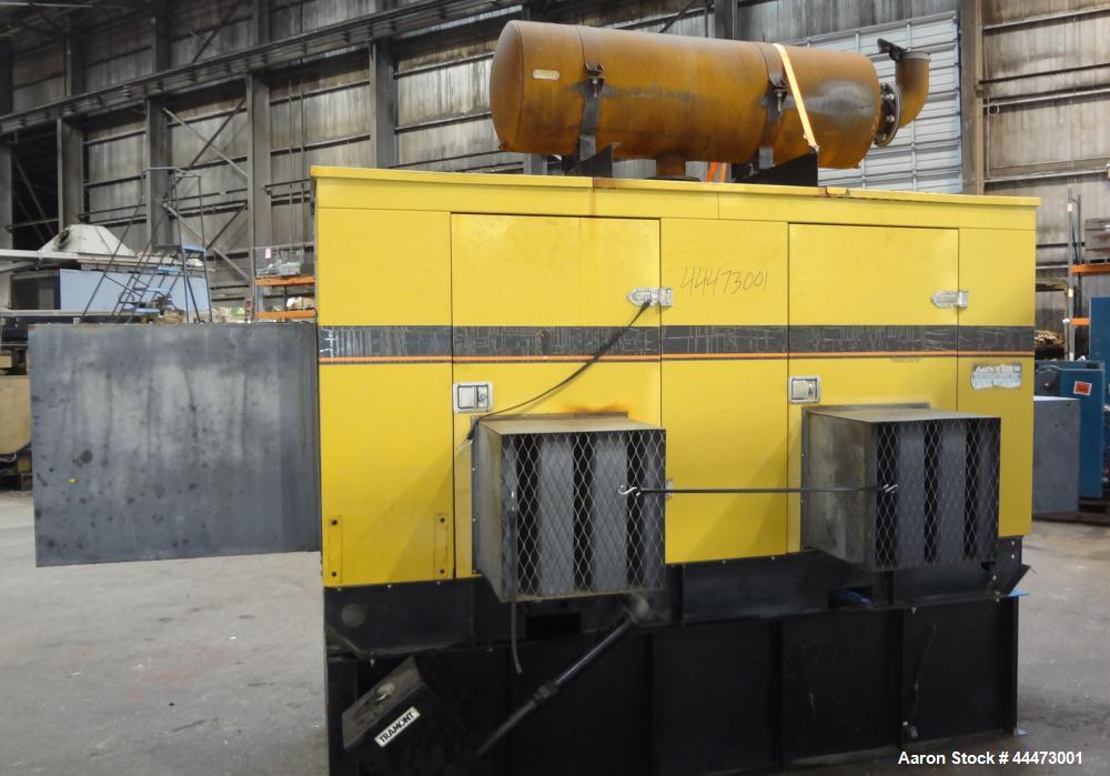Used Caterpillar / Olympian 200 kW Standby Diesel Generator Set, CAT model 3208 engine rated 299 hp @ 1800 rpm, serial #5YF03072. 3/60/277/480V. 350 Amp main-line circuit breaker. Weather enclosure. ...
