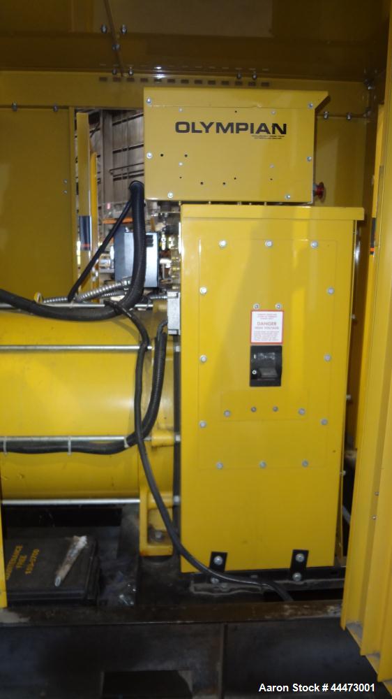 Used Caterpillar / Olympian 200 kW Standby Diesel Generator Set, CAT model 3208 engine rated 299 hp @ 1800 rpm, serial #5YF03072. 3/60/277/480V. 350 Amp main-line circuit breaker. Weather enclosure. ...