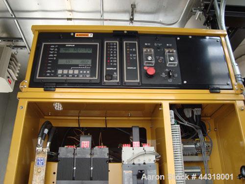 Used CAT 600 kW standby diesel generator set, SN-AER00103, Caterpillar 3412 engine rated 896 HP at 1800 RPM, SN-3FZ02299. 3/60/277/480V. 1200 Amp main-line circuit breaker and 600 Amp load bank circu...