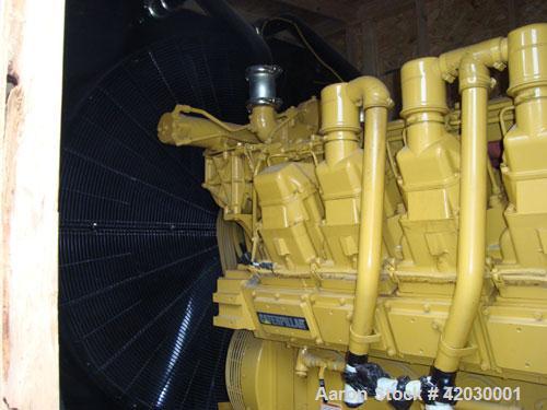 Used Caterpillar 1250 kW Diesel Generator Set. CAT model 3512DITA diesel engine rated 1818 HP @ 1800 RPM SN-1KZ01076, arrangement 1979048.Unit SN-CMJ00586. CAT model SR4 generator end serial 2FN01834...