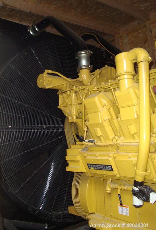Used Caterpillar 1250 kW Diesel Generator Set. CAT model 3512DITA diesel engine rated 1818 HP @ 1800 RPM SN-1KZ01076, arrangement 1979048.Unit SN-CMJ00586. CAT model SR4 generator end serial 2FN01834...