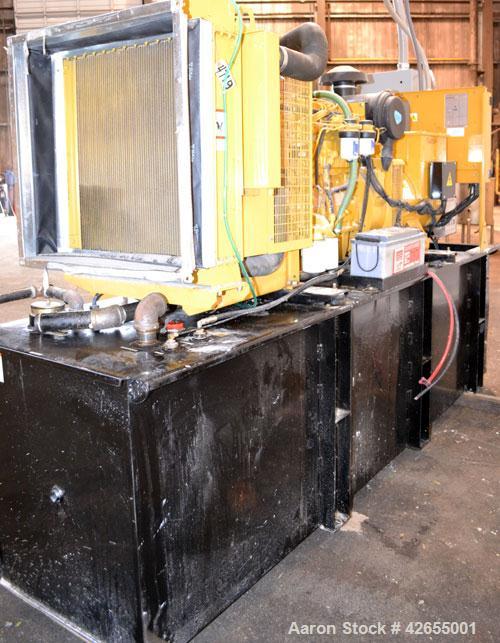 Used Caterpillar / Olympian 150 kW diesel generator set. Olympian model D150P1, SN-F2469E/001. 3/60/277-480V. PMG (permanent magnet excitation) Battery charger. Tremont 400 gallon sub base fuel tank....