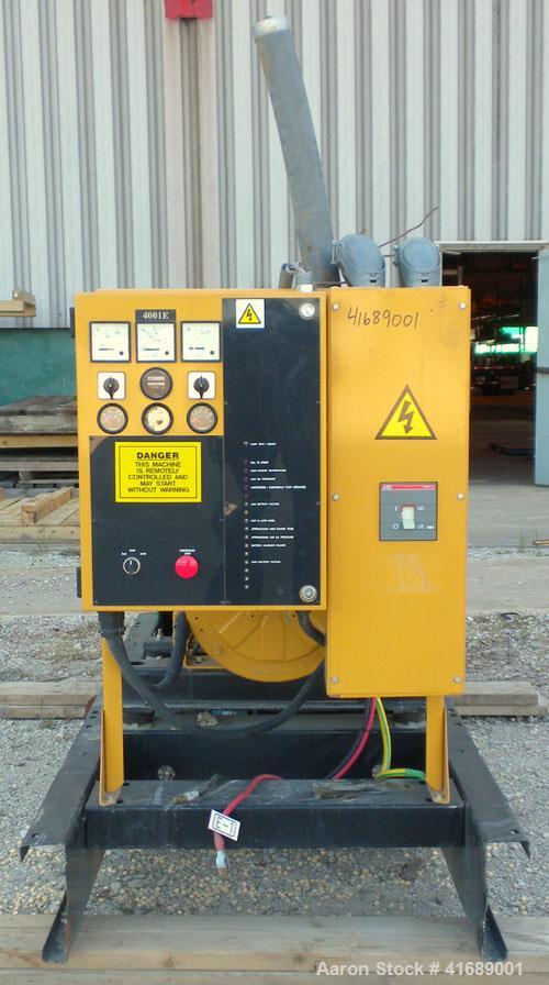 Used CAT/Olympian 60 kW Natural Gas Generator Set, Model G60F1, Serial #E0519A/001. Ford Motor Co natural gas engine, model WSG1068, V10. 3/60/120/240V. Hours 255, year 1999.