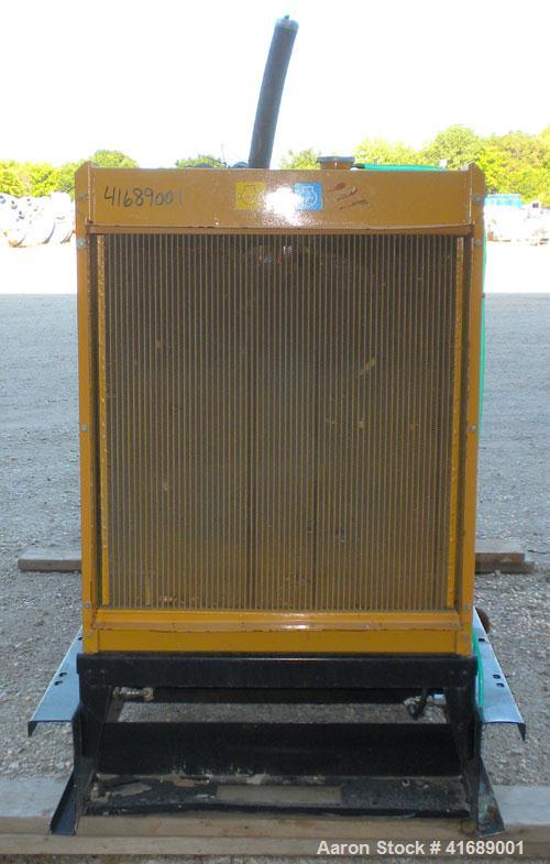 Used CAT/Olympian 60 kW Natural Gas Generator Set, Model G60F1, Serial #E0519A/001. Ford Motor Co natural gas engine, model WSG1068, V10. 3/60/120/240V. Hours 255, year 1999.