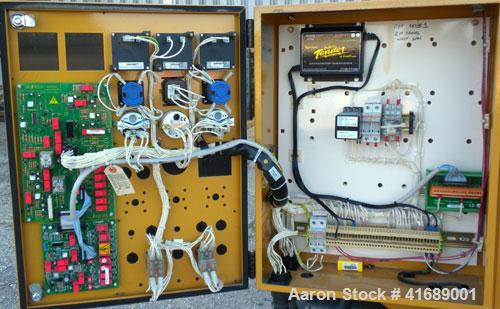 Used CAT/Olympian 60 kW Natural Gas Generator Set, Model G60F1, Serial #E0519A/001. Ford Motor Co natural gas engine, model WSG1068, V10. 3/60/120/240V. Hours 255, year 1999.