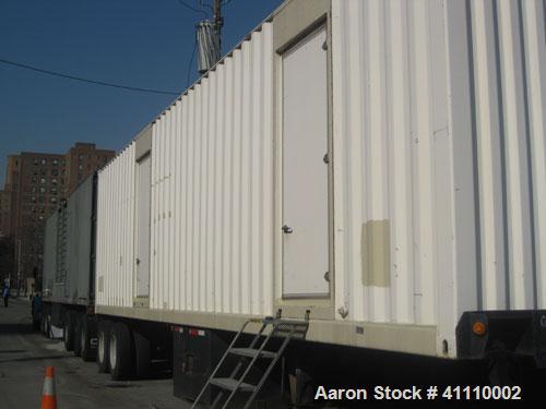 Used CAT 1250kW power module.3/60/277-480V.CAT model 3512 DITA engine, SR-4B generator end.Mounted in a portable 40' 2-axle trailer 72 DBA sound attenuation.1250 gallon double wall fuel tank. 570 hou...