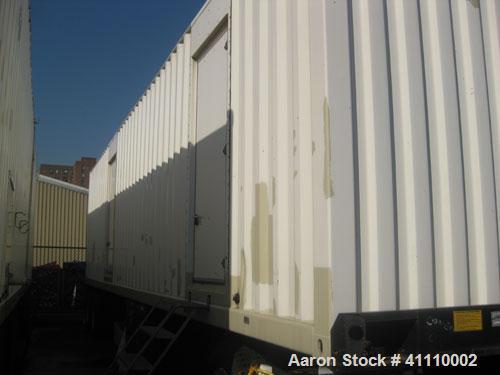 Used CAT 1250kW power module.3/60/277-480V.CAT model 3512 DITA engine, SR-4B generator end.Mounted in a portable 40' 2-axle trailer 72 DBA sound attenuation.1250 gallon double wall fuel tank. 570 hou...