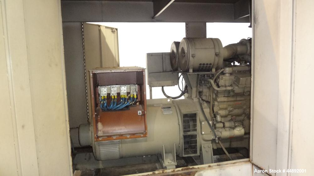 Used Cummins 600 kW Standby Diesel Generator Set. Cummins model VTA-28GS2-49999 engine rated 900 hp @ 1800 rpm, serial #37119900. 3/60/277/480V. Drop over weather enclosure.  154 hours. Year 1988.  P...