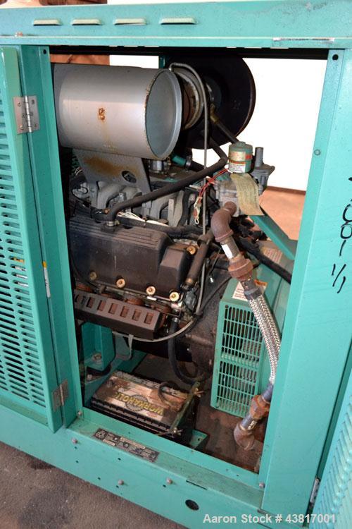 Used Cummins 100 kW standby natural gas generator set, model GGHH-5569198, SN-J020420586. Ford WSG-1068 engine rated 176 HP @ 1800 RPM.3/60/277/480V, rated 100kW 1/60/120V. 125 Amp main-line circuit ...
