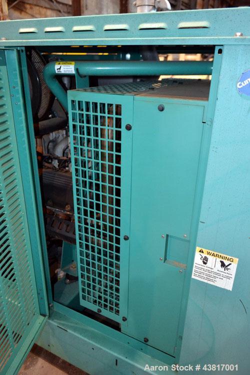 Used Cummins 100 kW standby natural gas generator set, model GGHH-5569198, SN-J020420586. Ford WSG-1068 engine rated 176 HP @ 1800 RPM.3/60/277/480V, rated 100kW 1/60/120V. 125 Amp main-line circuit ...