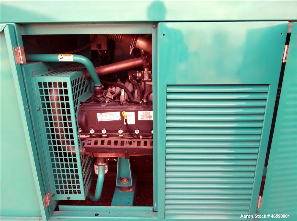 Used Cummins 100 kW natural gas generator set model GGHH-5776259, SN-I060976839. Ford WSG-1068 engine rated 176 HP at 1800 RPM, SN-06RS59698. 3/60/120/208V, 12 lead reconnectable to other voltages. 4...