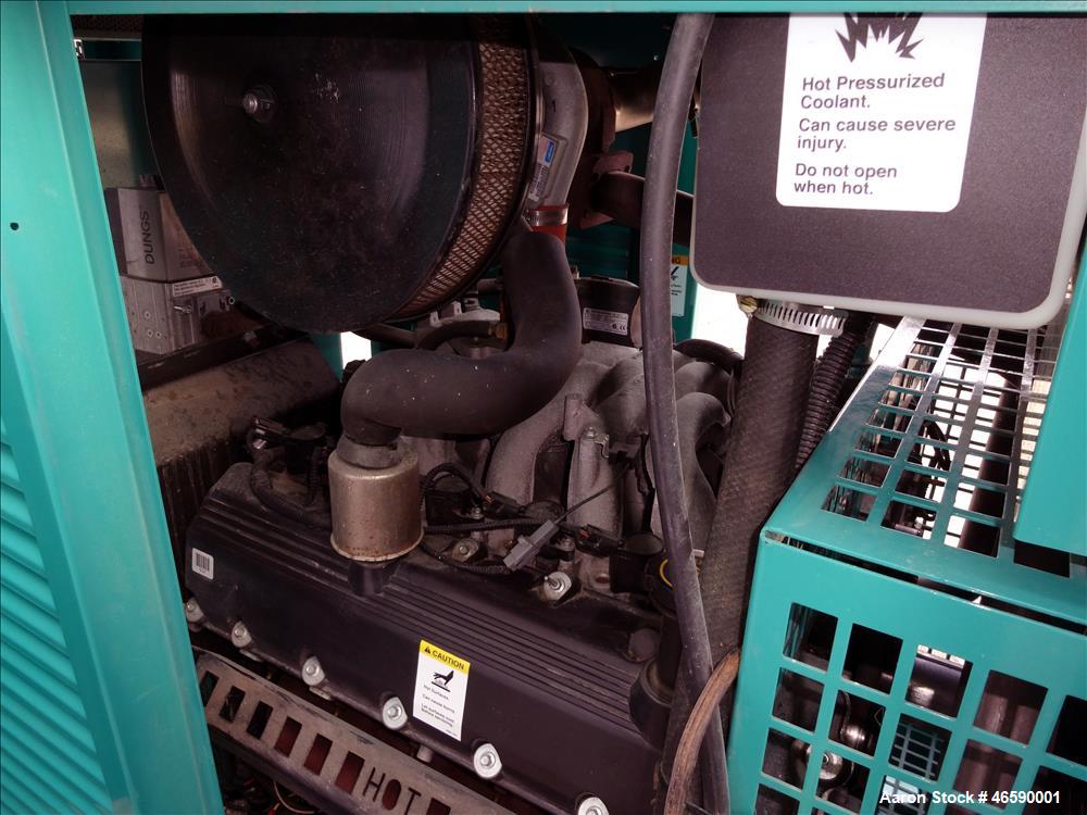 Used Cummins 100 kW natural gas generator set model GGHH-5776259, SN-I060976839. Ford WSG-1068 engine rated 176 HP at 1800 RPM, SN-06RS59698. 3/60/120/208V, 12 lead reconnectable to other voltages. 4...