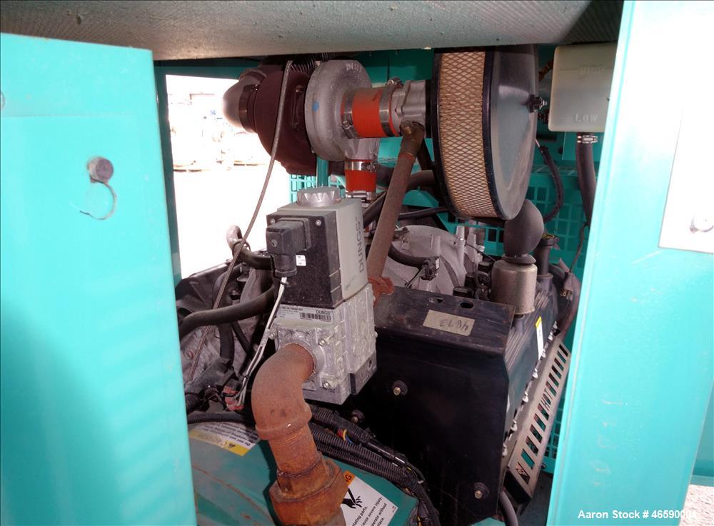 Used Cummins 100 kW natural gas generator set model GGHH-5776259, SN-I060976839. Ford WSG-1068 engine rated 176 HP at 1800 RPM, SN-06RS59698. 3/60/120/208V, 12 lead reconnectable to other voltages. 4...