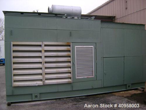 Used Cummins 400kW continuous rated natural gas generator set. Cummins rich burn engine, model GIA-28. 2113 hours since new in 1994, sound enclosure, control panel, circuit breaker, mufflers, cooler ...