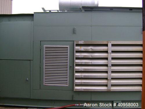 Used Cummins 400kW continuous rated natural gas generator set. Cummins rich burn engine, model GIA-28. 2113 hours since new in 1994, sound enclosure, control panel, circuit breaker, mufflers, cooler ...