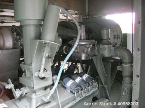 Used Cummins 400kW continuous rated natural gas generator set. Cummins rich burn engine, model GIA-28. 2113 hours since new in 1994, sound enclosure, control panel, circuit breaker, mufflers, cooler ...