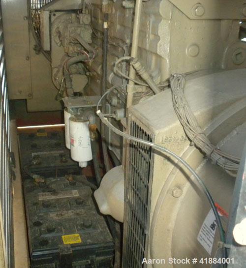 Used Cummins 200 kW standby diesel generator set. Cummins model NT-855-G4 engine, serial# 1161-7668, Rated 375 hp @ 1800 rpm. 3/60/208-240/380-480 volt generator end ID # 200DFBC/38795F. Battery char...