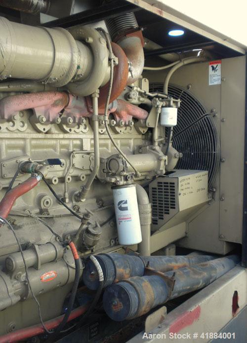 Used Cummins 200 kW standby diesel generator set. Cummins model NT-855-G4 engine, serial# 1161-7668, Rated 375 hp @ 1800 rpm. 3/60/208-240/380-480 volt generator end ID # 200DFBC/38795F. Battery char...